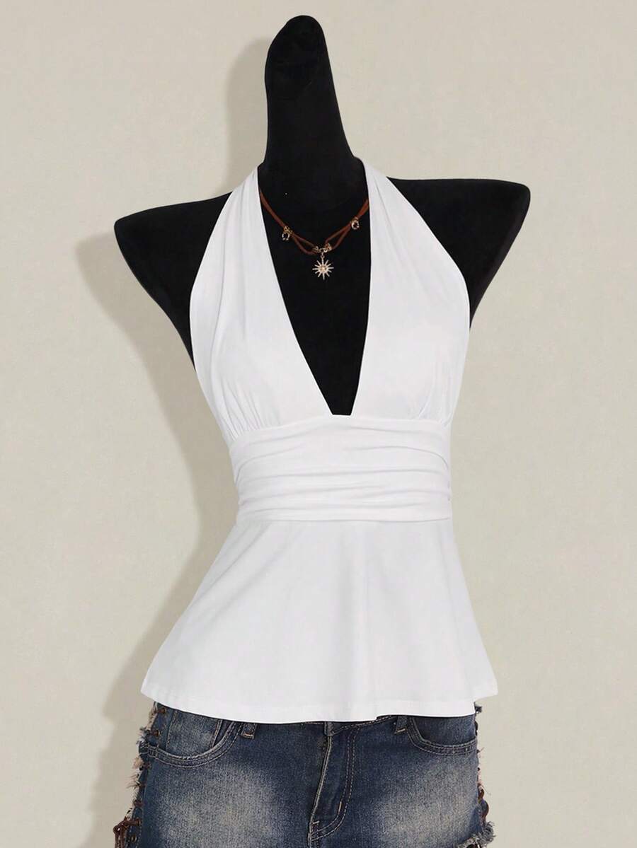 Women's backless halter babydoll tank top featuring a square neckline, slim fit silhouette, and a flared ruffle hem.