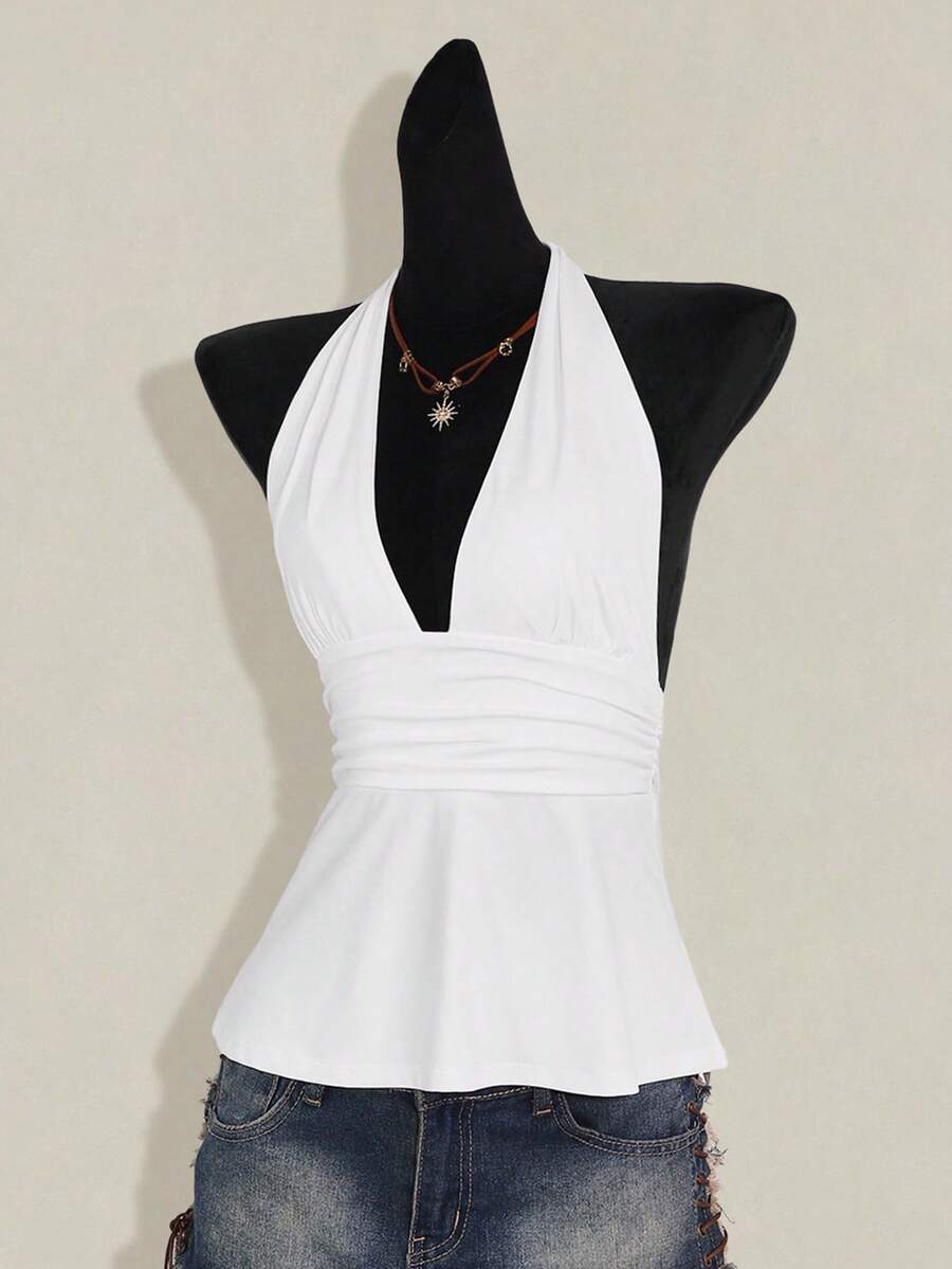 Women's backless halter babydoll tank top featuring a square neckline, slim fit silhouette, and a flared ruffle hem.