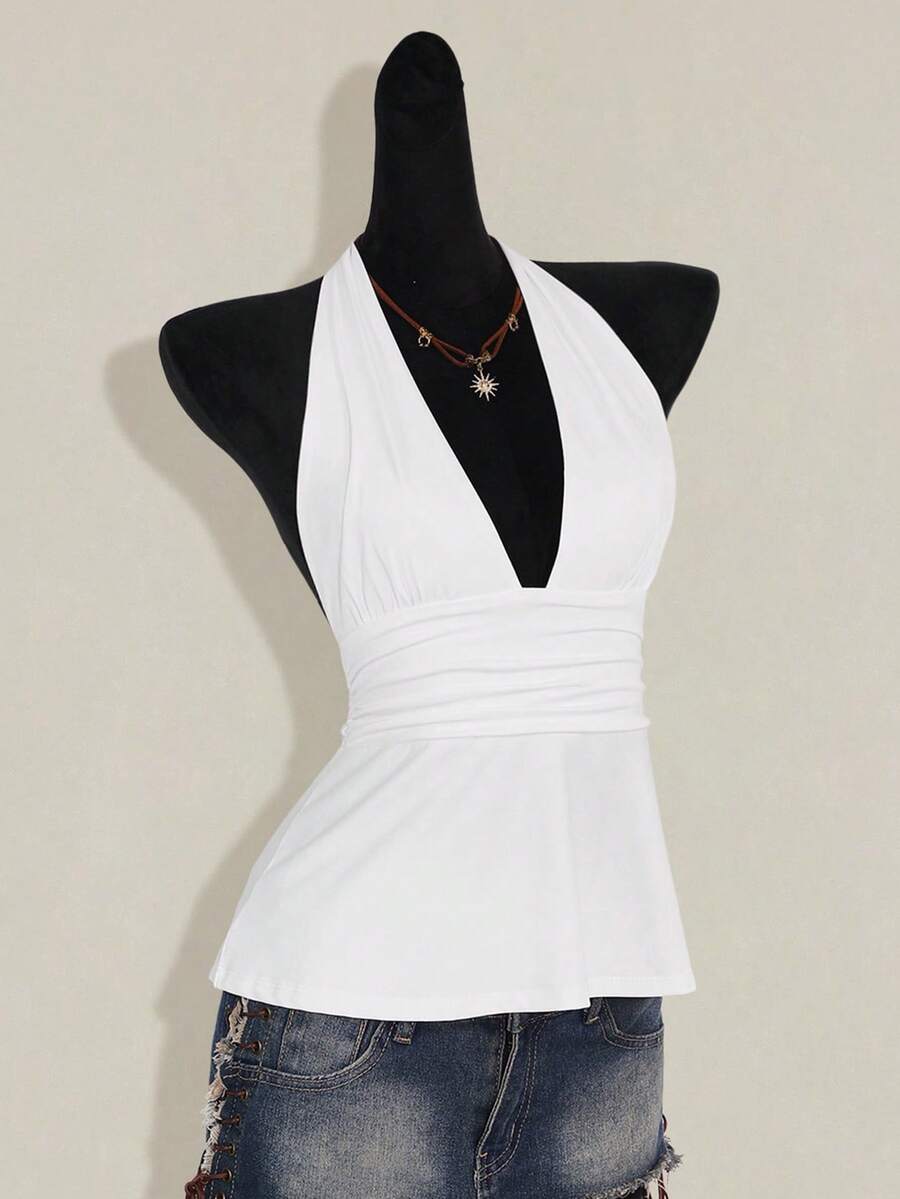 Women's backless halter babydoll tank top featuring a square neckline, slim fit silhouette, and a flared ruffle hem.