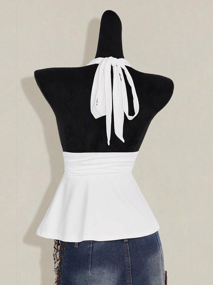 Women's backless halter babydoll tank top featuring a square neckline, slim fit silhouette, and a flared ruffle hem.