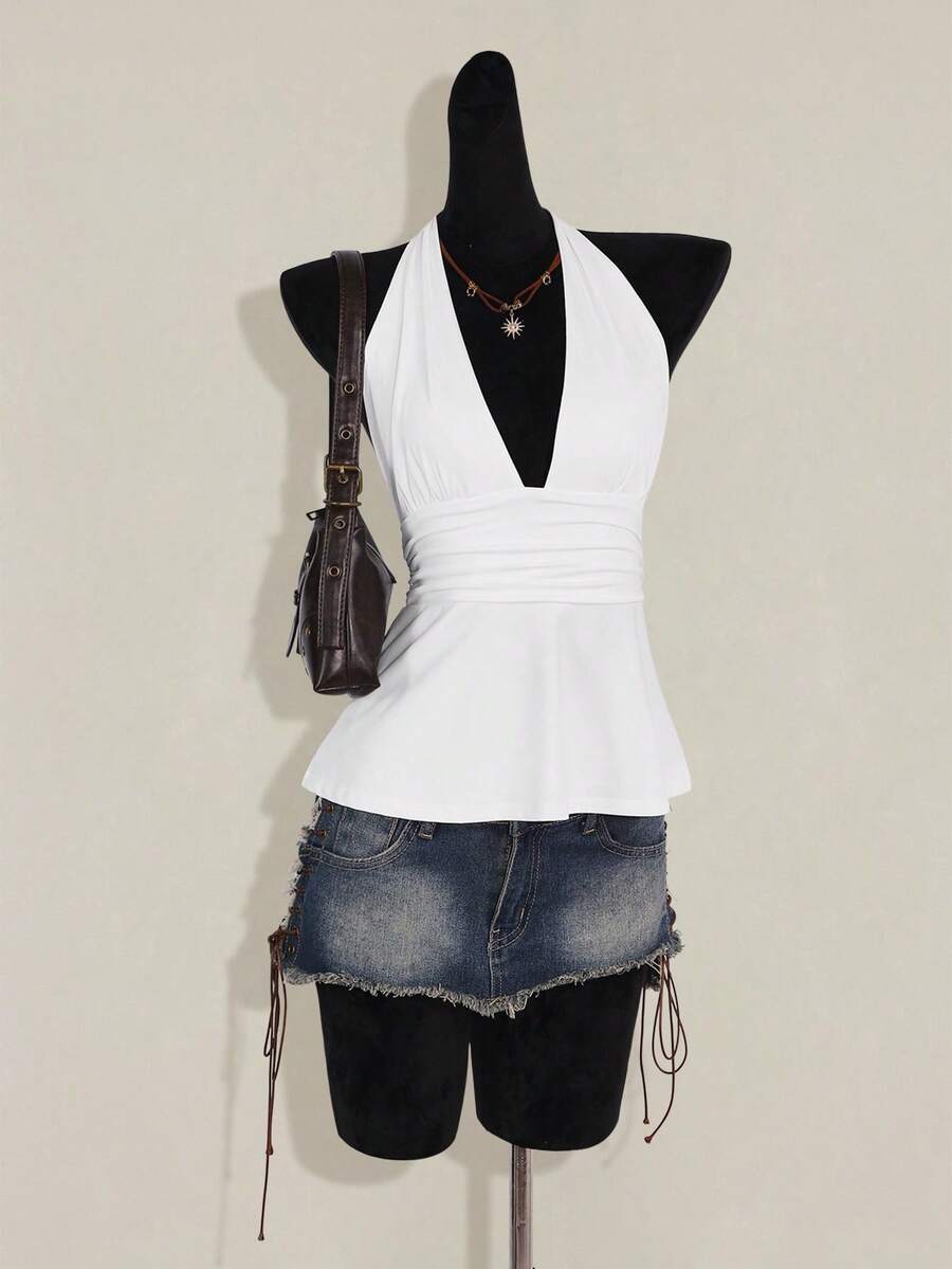 Women's backless halter babydoll tank top featuring a square neckline, slim fit silhouette, and a flared ruffle hem.