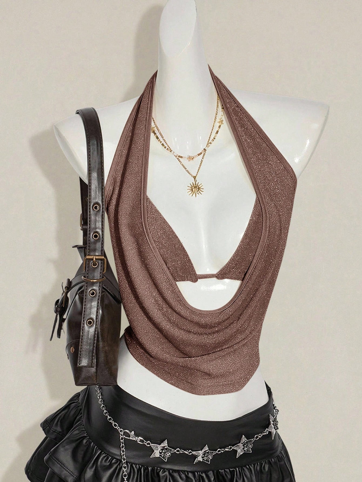 Women's glitter halter backless micro crop tank top featuring a draped knot front design.