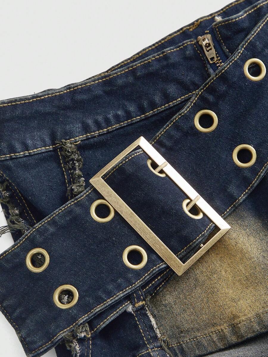 Black grunge punk low-waist mini shorts with studded details and zipper fly closure