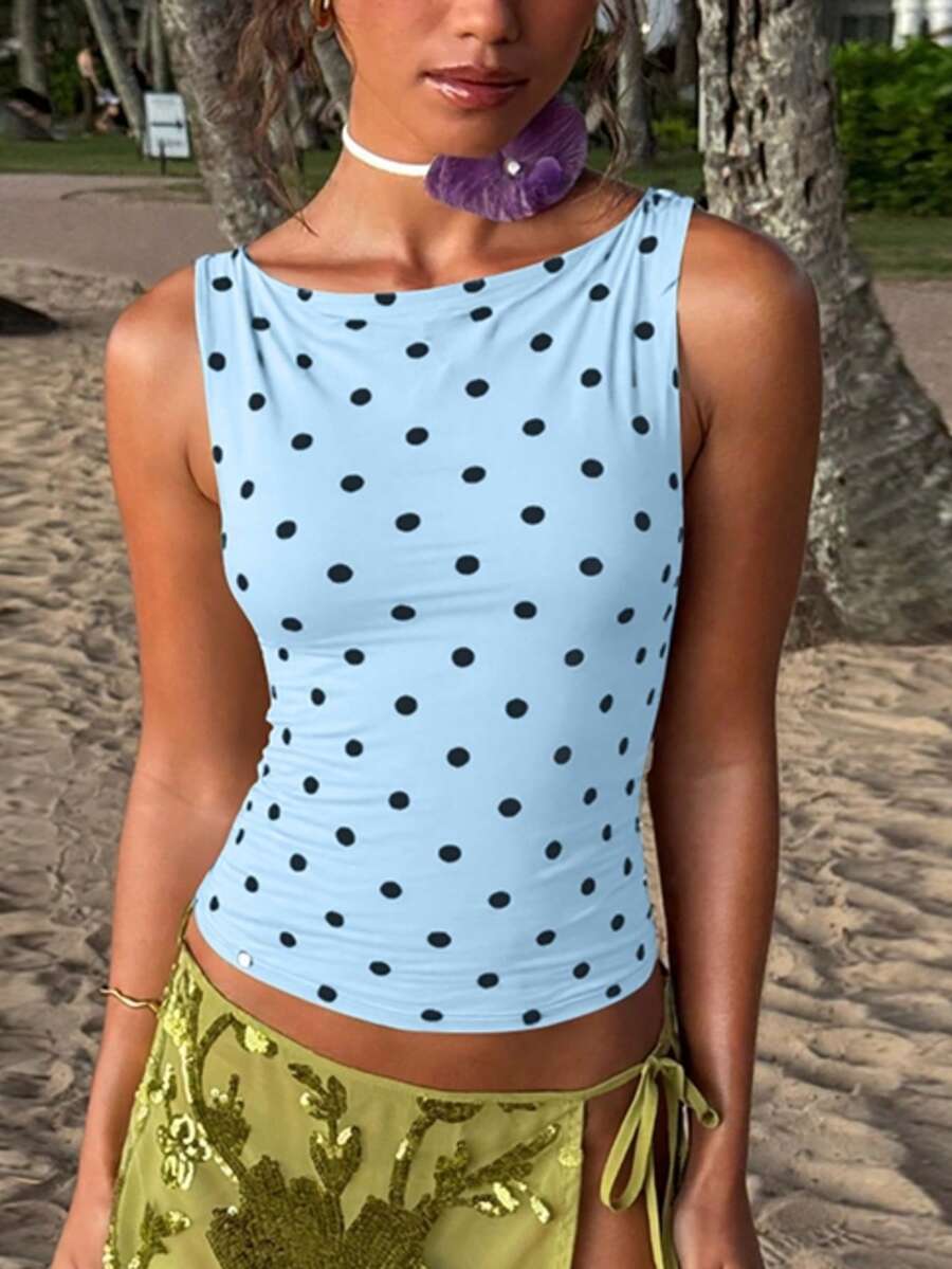 Women's polka dot sleeveless tank top with round neck, ruched rib-knit detail, regular hem, and slim fit casual style