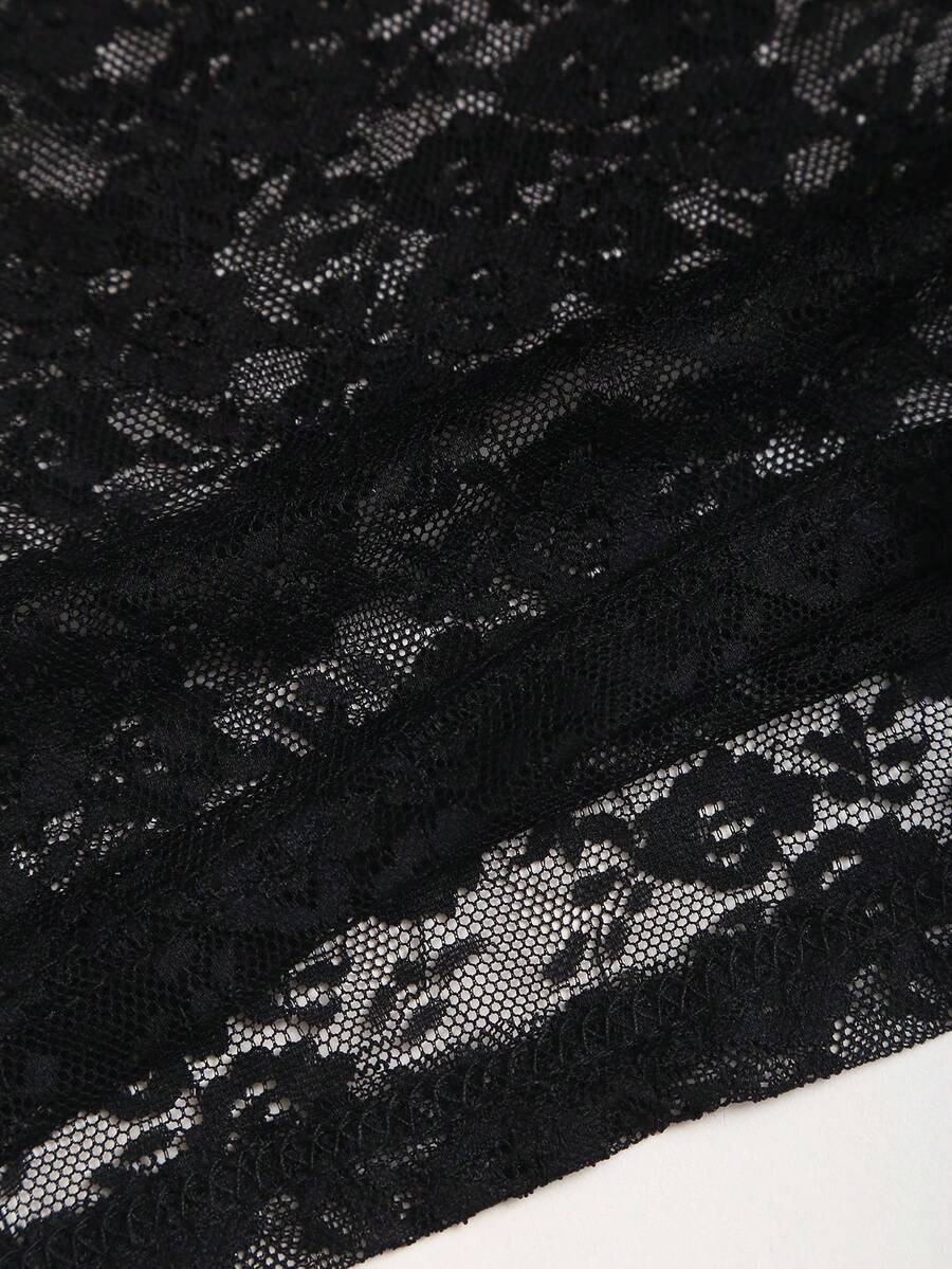 Women's black lace halter crop camisole featuring tie-back details, slim fit design, and matching arm sleeves.