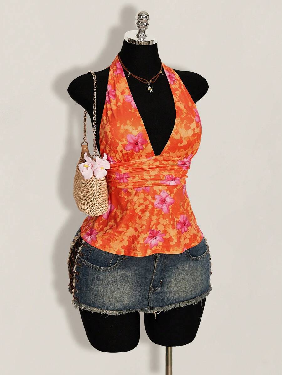 White women's deep V-neck halter tank top with ruched waist, backless design, rib-knit texture, and ruffle hem