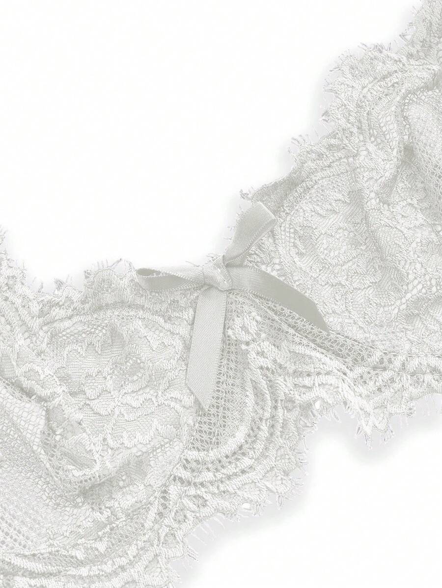 Sheer floral lace underwire triangle bra for women featuring adjustable straps and plunge cup design.