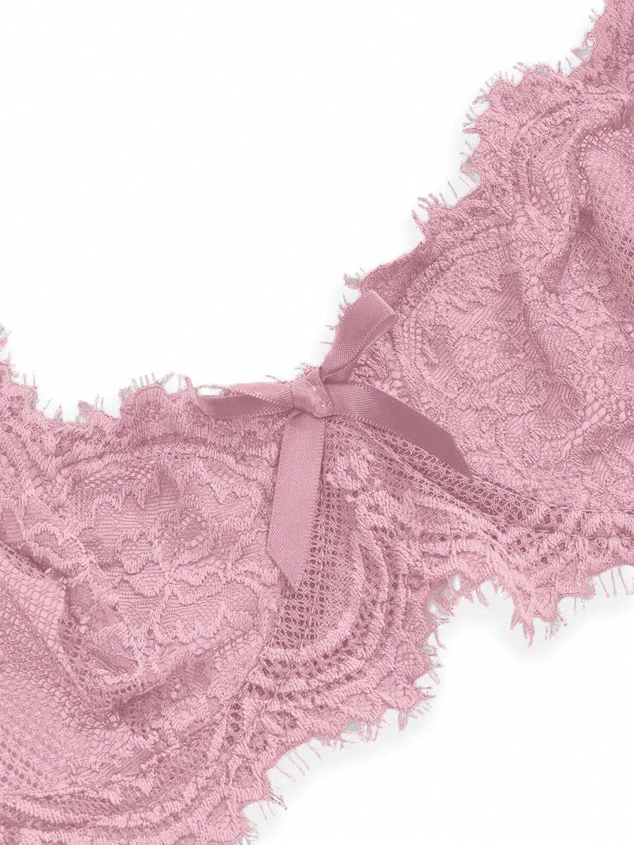 Sheer floral lace underwire triangle bra for women featuring adjustable straps and plunge cup design.