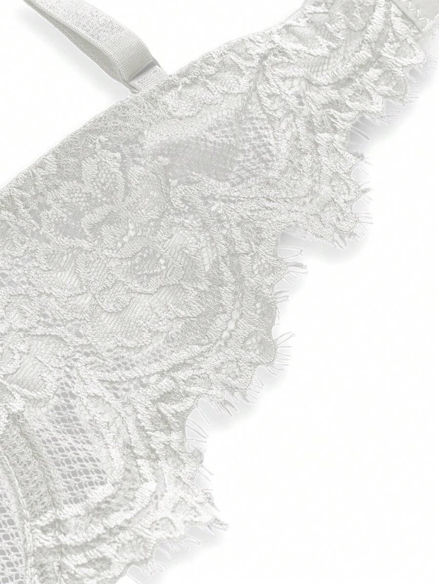 Sheer floral lace underwire triangle bra for women featuring adjustable straps and plunge cup design.