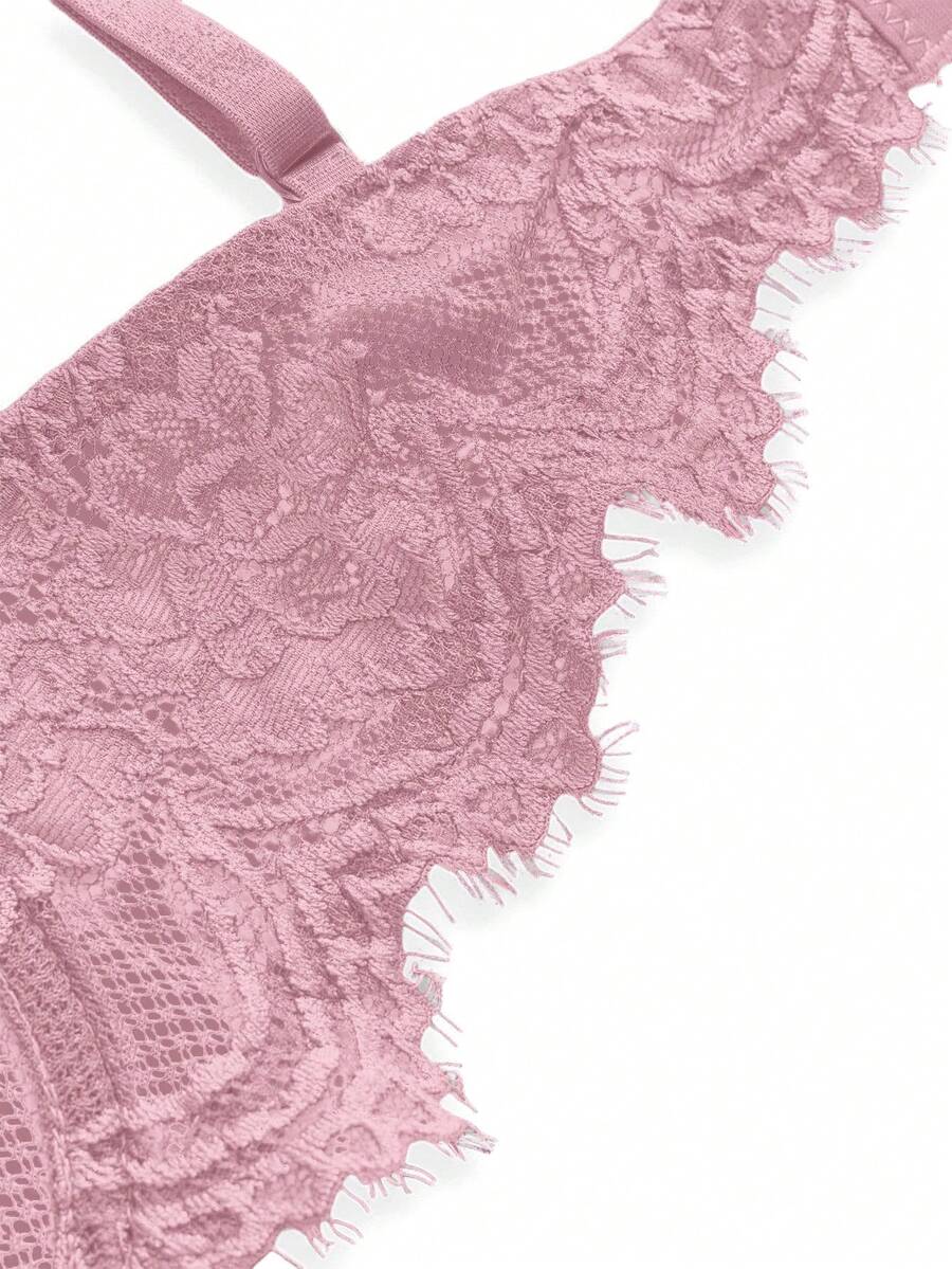 Sheer floral lace underwire triangle bra for women featuring adjustable straps and plunge cup design.