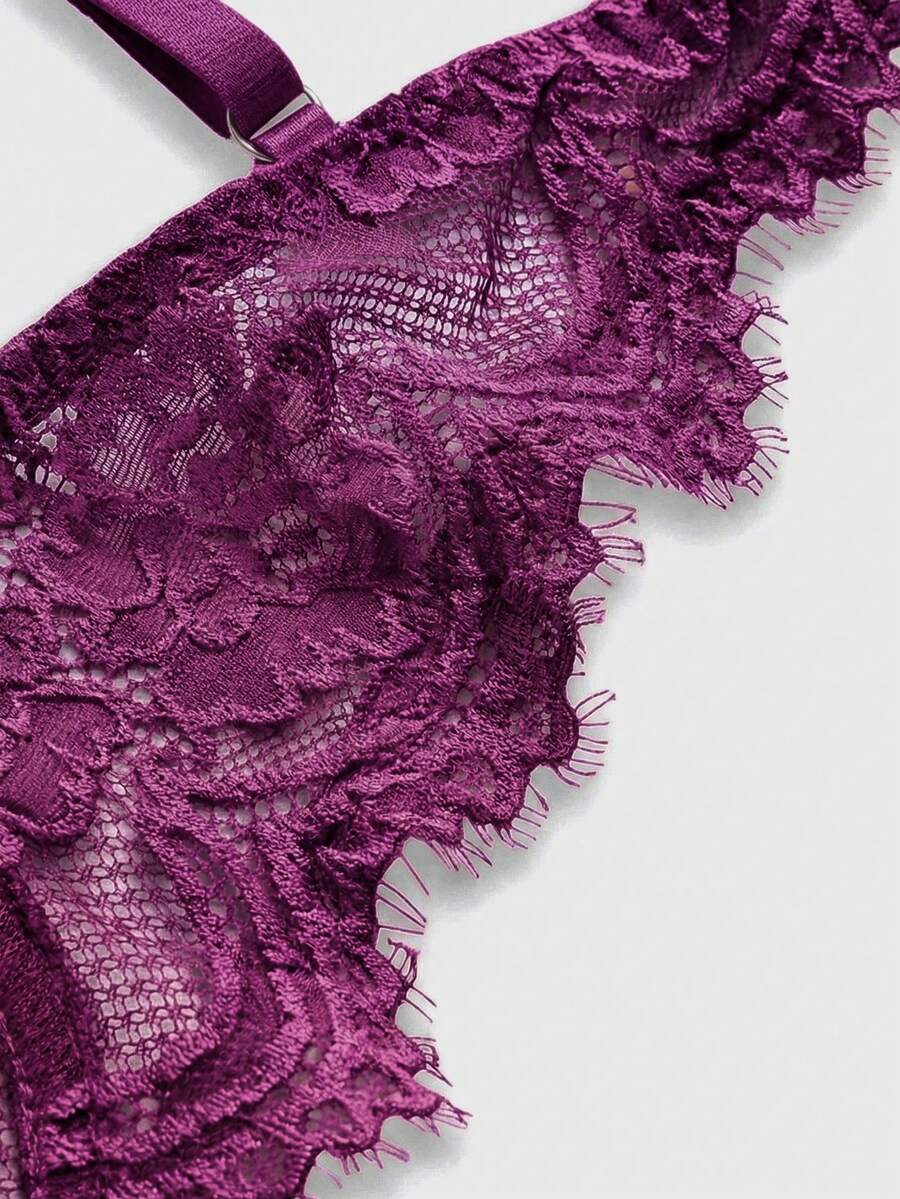 Sheer floral lace underwire triangle bra for women featuring adjustable straps and plunge cup design.