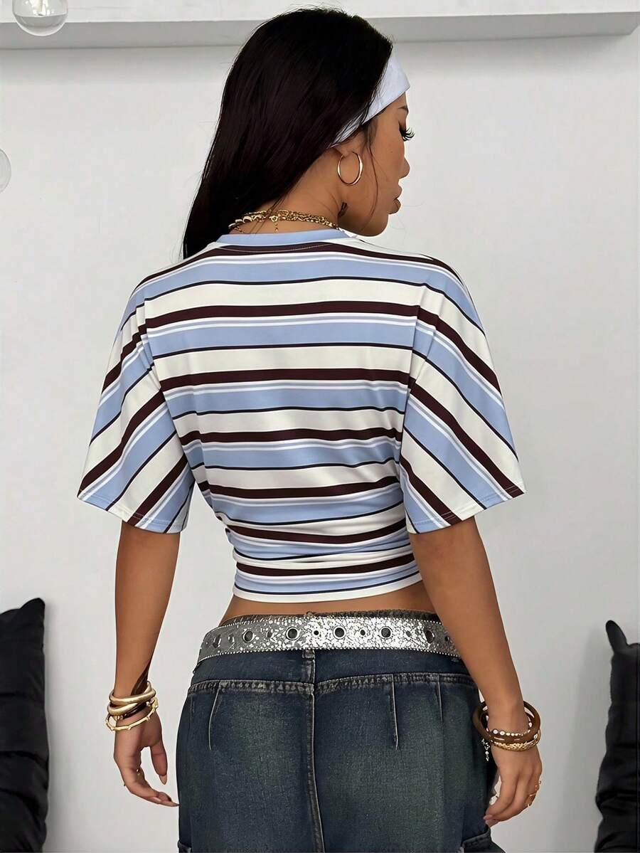 Women's striped short sleeve t-shirt featuring a casual drop shoulder design and round neckline.