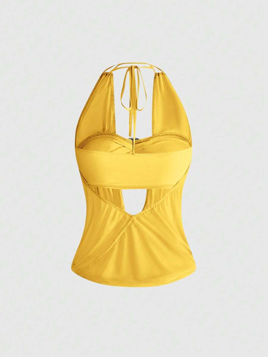 Women's Y2K retro crop tank top with draped halter neckline, cut-out detail, slim fit, and backless design