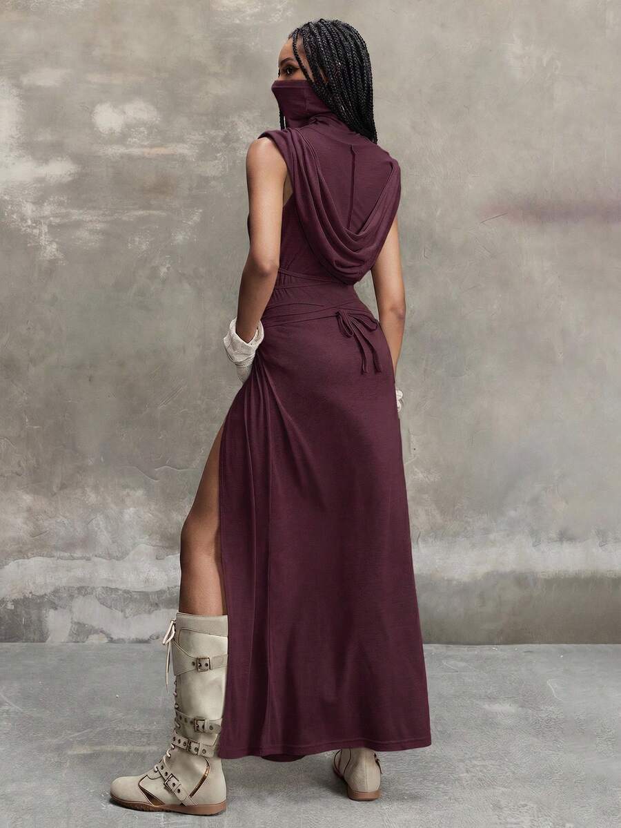Women's sleeveless hooded maxi dress featuring a plunging neckline, backless design, and high thigh split in a lightweight knit fabric.