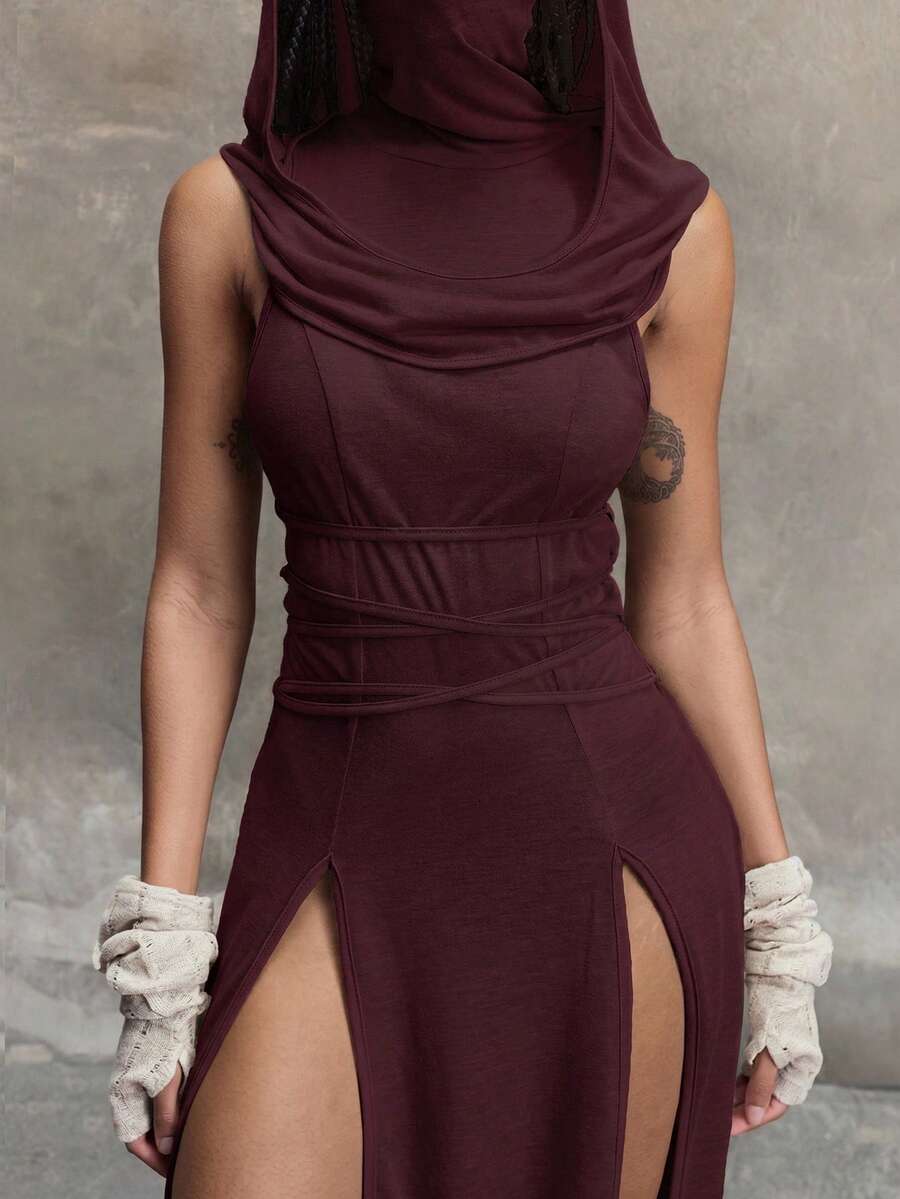 Women's sleeveless hooded maxi dress featuring a plunging neckline, backless design, and high thigh split in a lightweight knit fabric.