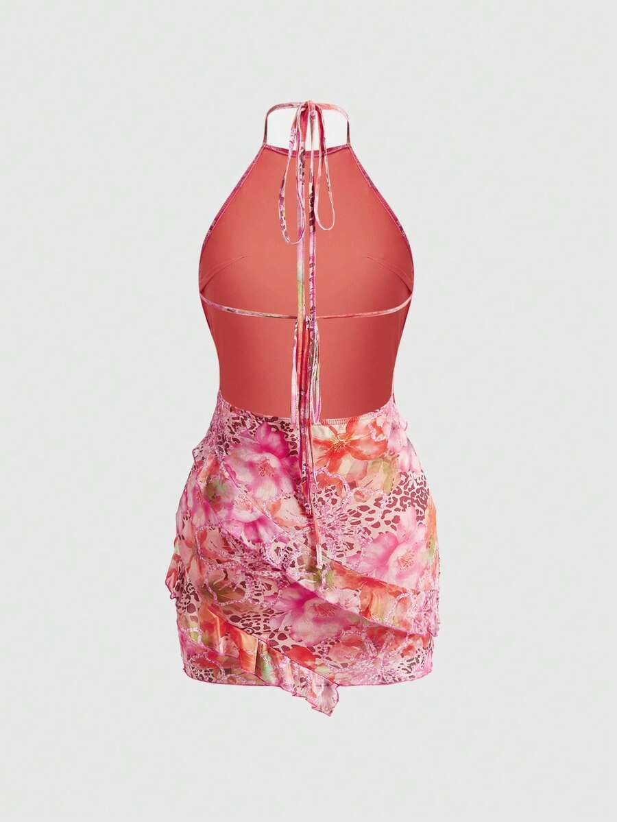 Women's brown boho halter mini dress with leopard and floral print, backless knot detail, contrast lace, slim fit, sleeveless cami style, and pencil hem.
