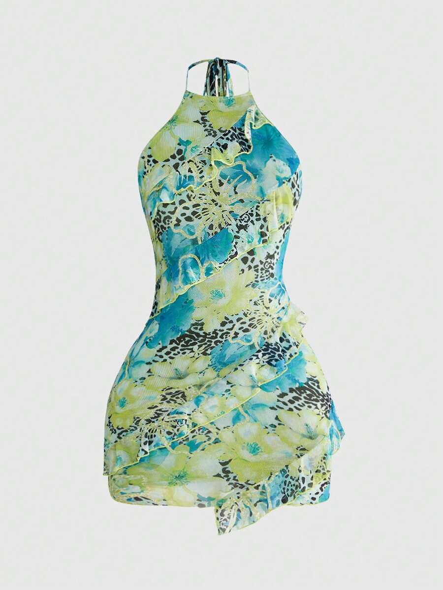 Women's brown boho halter mini dress with leopard and floral print, backless knot detail, contrast lace, slim fit, sleeveless cami style, and pencil hem.