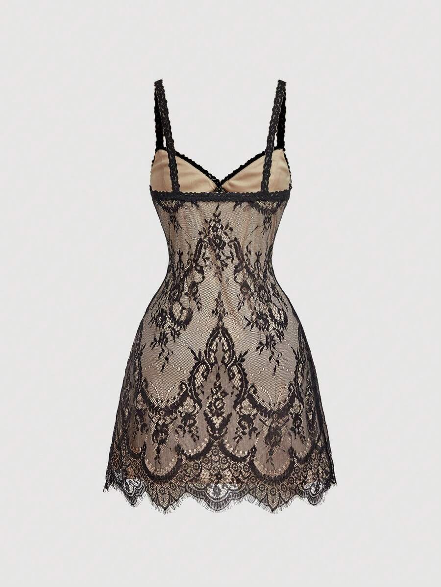 Women's short lace cami dress with spaghetti straps, contrast lace detailing, high waist, slim fit, and straight hem.