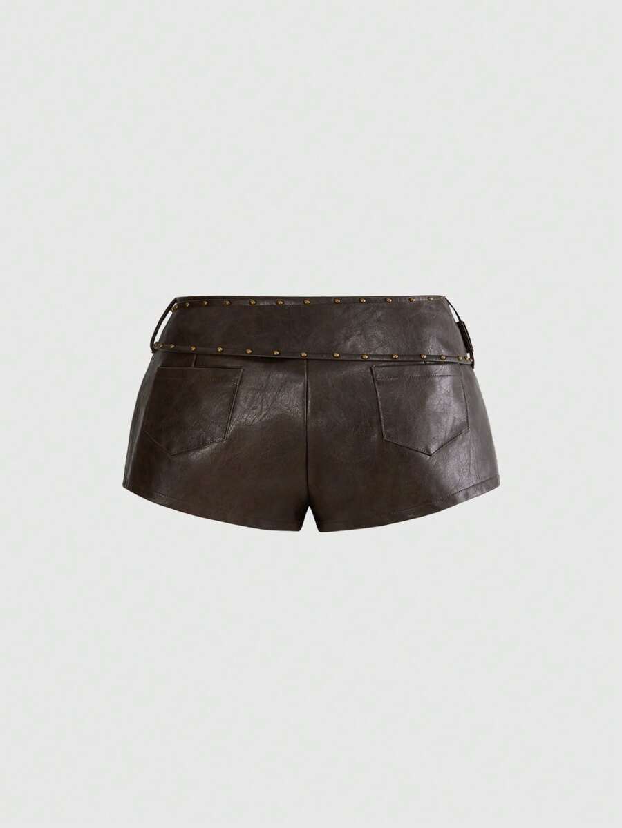 Brown ultra low waist PU bodycon mini shorts for women featuring studded rivet embellishments and a front zipper fly.