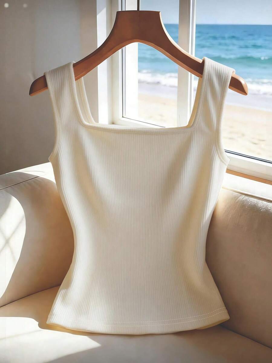 Women's slim fit square neck sleeveless knit tank top featuring a front faux placket with decorative gold metal buttons.