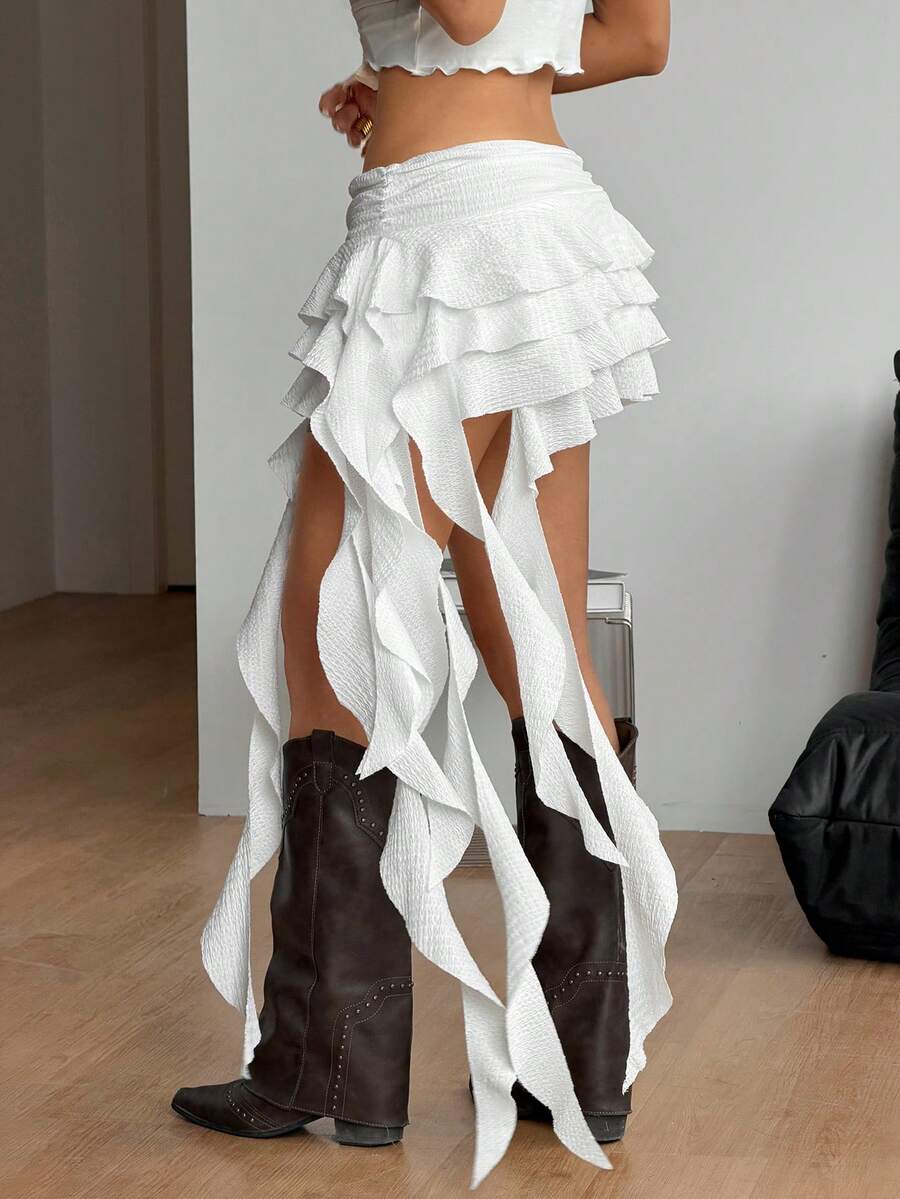 White lace tiered mini skirt for women with asymmetrical ruched layers and low waist design.