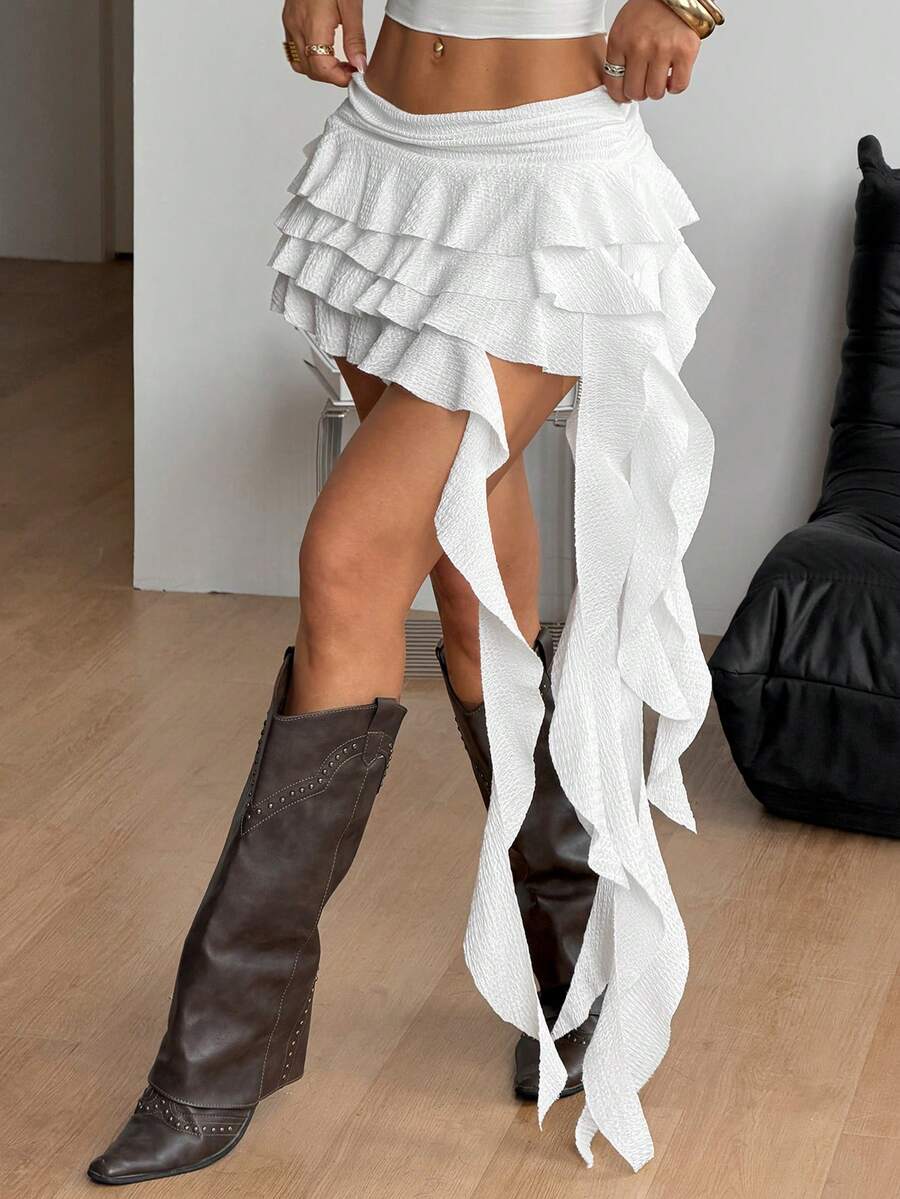White lace tiered mini skirt for women with asymmetrical ruched layers and low waist design.