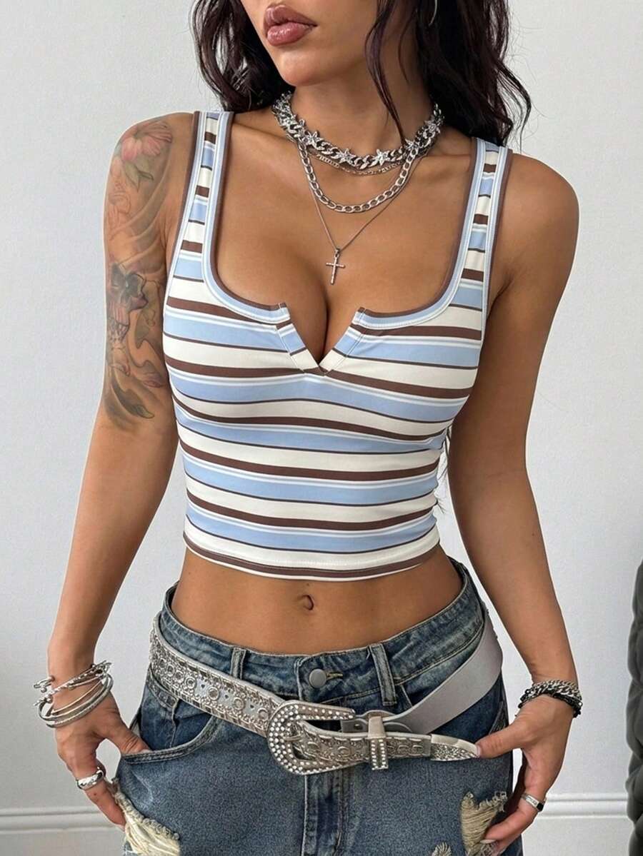 Women's striped rib-knit crop tank top with a notched neckline and slim fit.