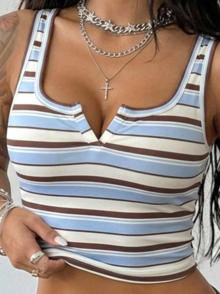 Women's striped rib-knit crop tank top with a notched neckline and slim fit.