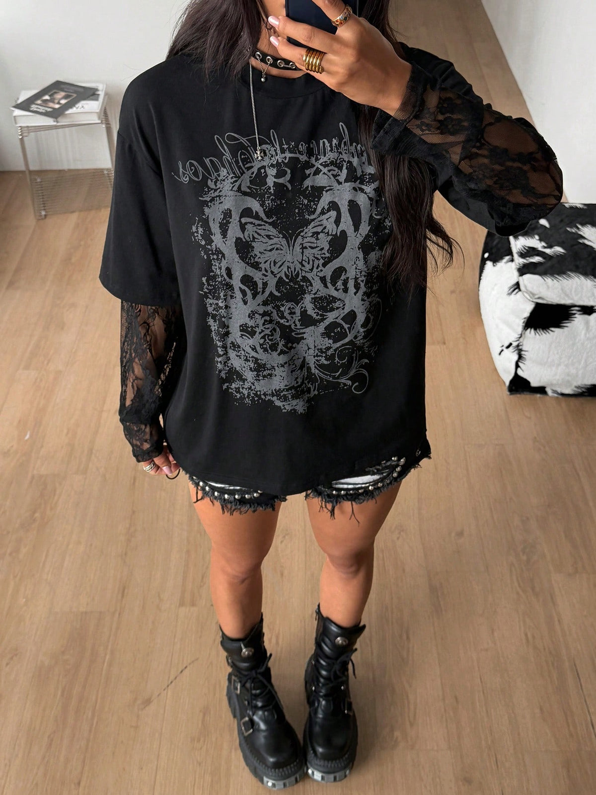 Women's casual graphic long sleeve t-shirt with a round neck, drop shoulder sleeves, and loose relaxed fit.