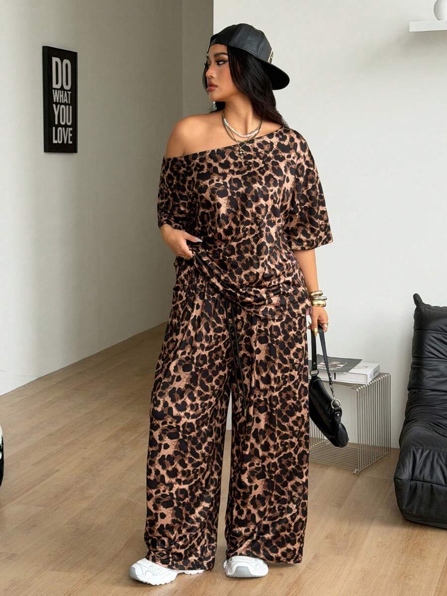 Women's two-piece lounge set featuring a loose drop shoulder asymmetrical neck short sleeve t-shirt and wide-leg knit pants with pockets.