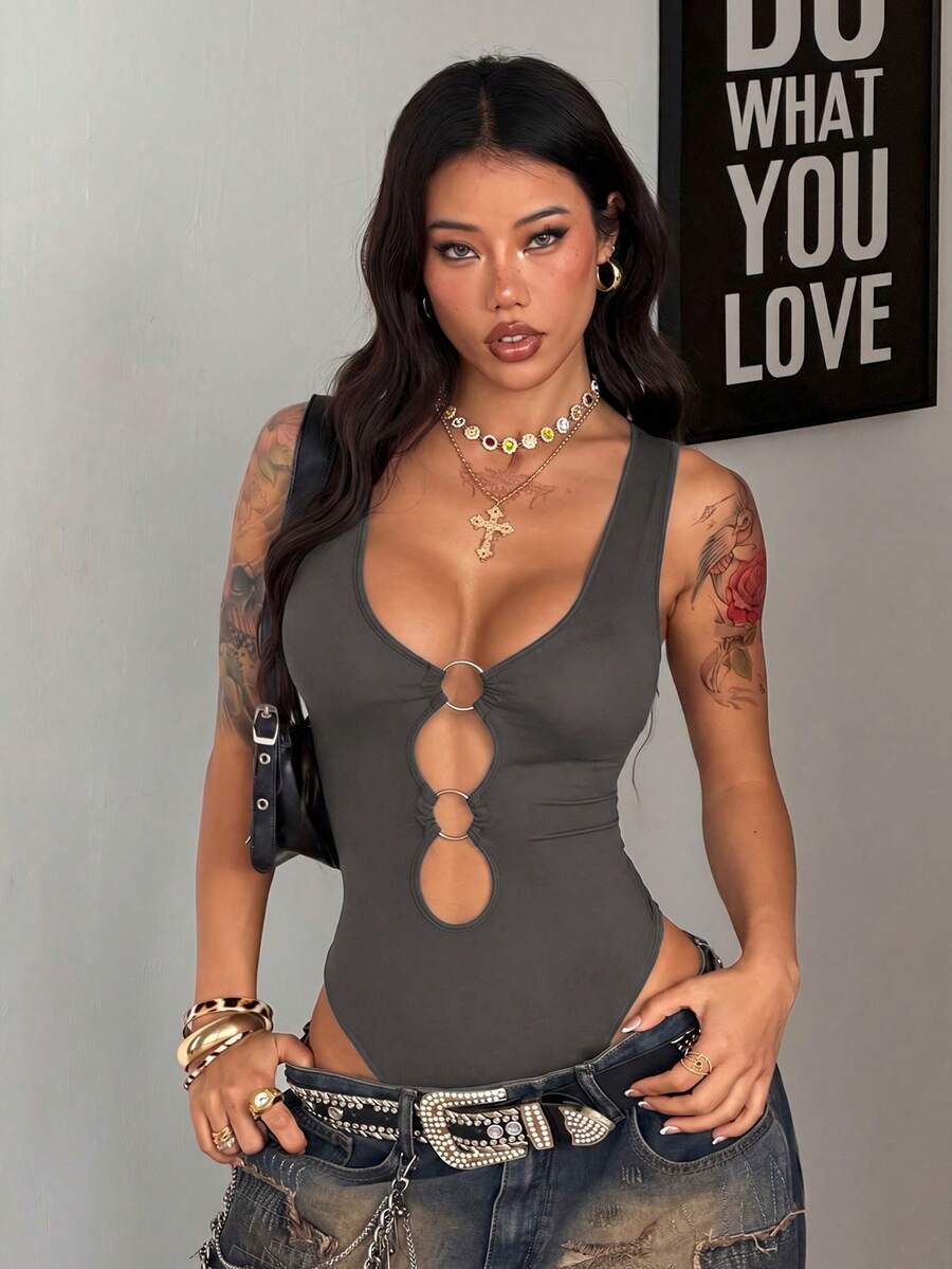 Women's dark grey sleeveless cut out bodysuit with V-neckline and ring accent in high stretch knitted fabric.