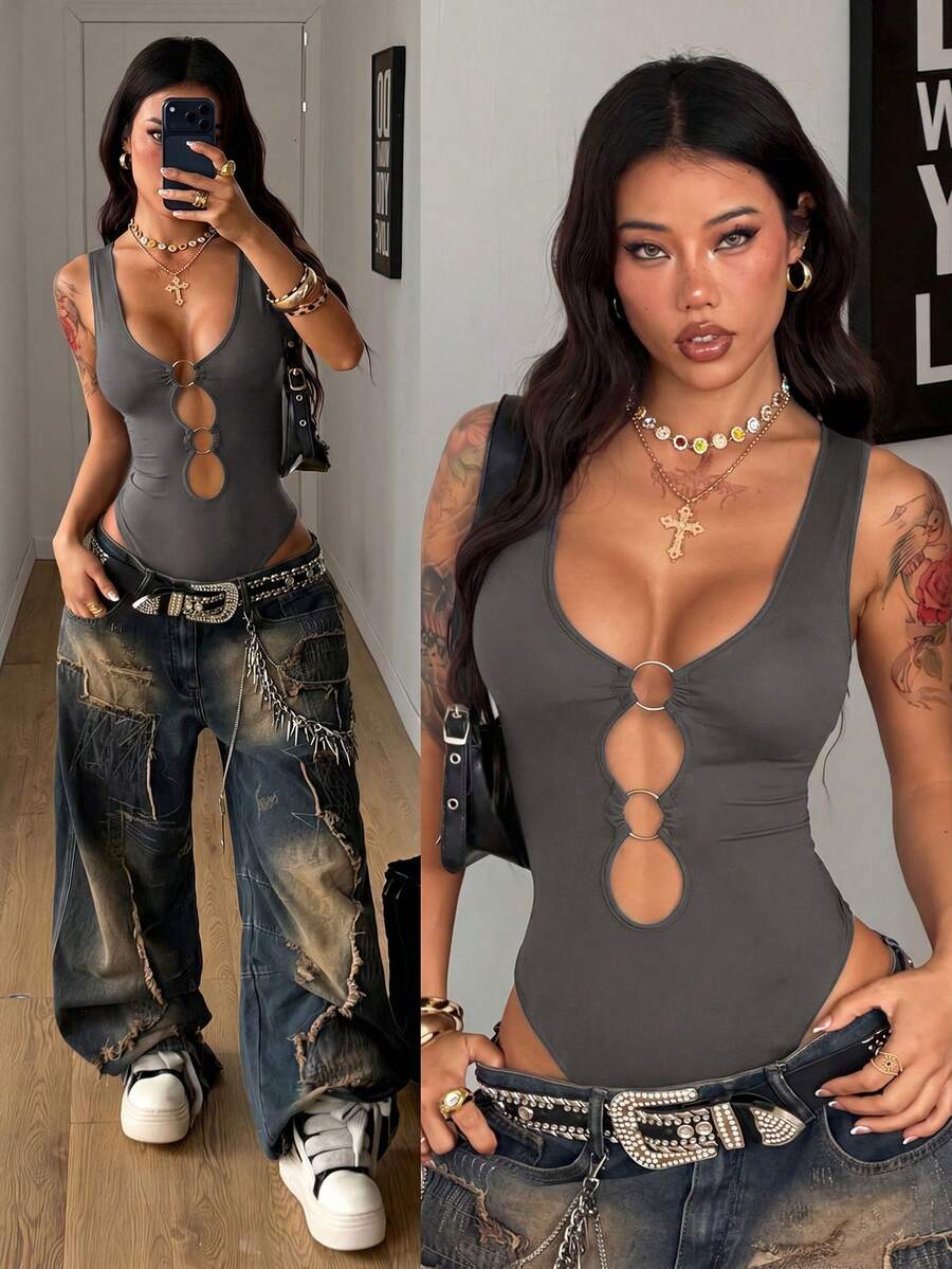 Women's dark grey sleeveless cut out bodysuit with V-neckline and ring accent in high stretch knitted fabric.