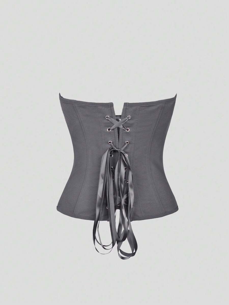 Solid color strapless corset tube top featuring a backless lace-up back design and cropped slim fit.