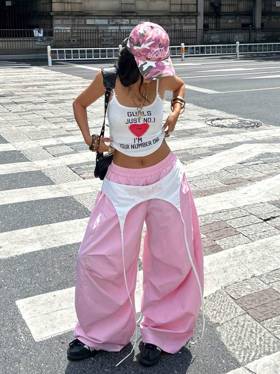 Women's casual wide leg long pants featuring an elastic drawstring waistband and loose fit silhouette.
