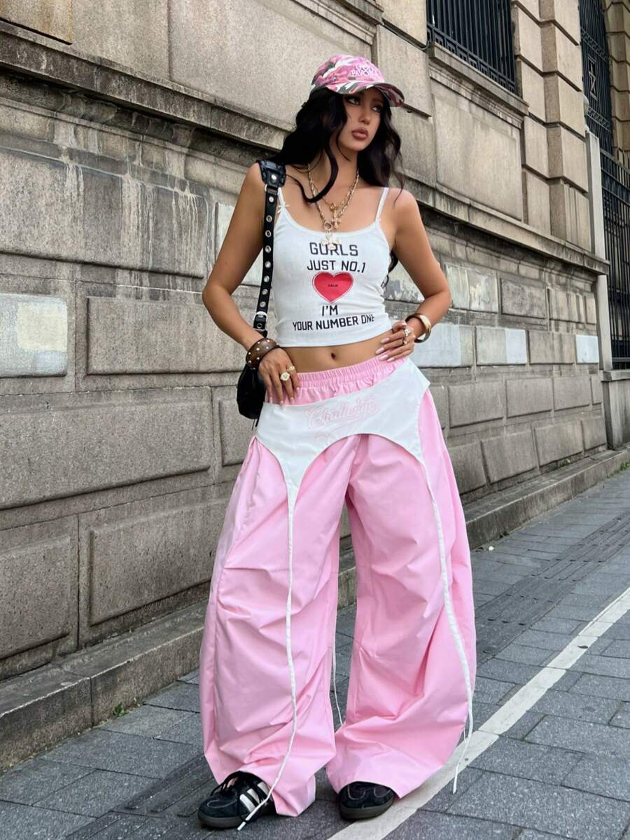 Women's casual wide leg long pants featuring an elastic drawstring waistband and loose fit silhouette.