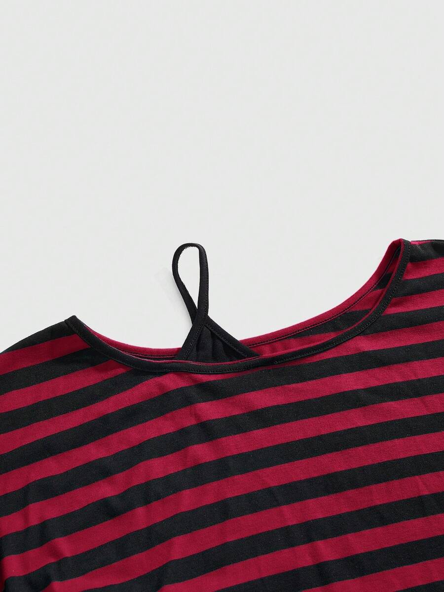 Women's striped t-shirt featuring an asymmetric cold shoulder neckline, batwing short sleeves, and ruched drawstring details in a loose knit fit.