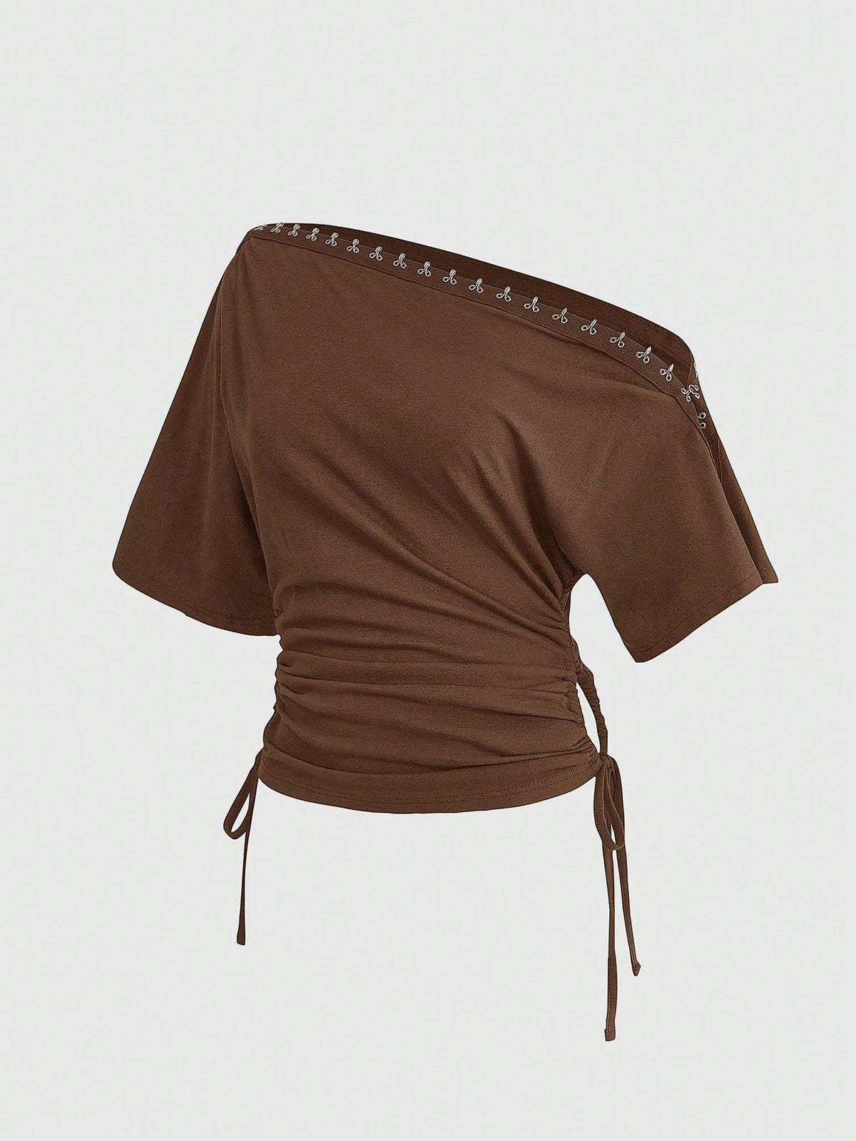 Women's slim fit short sleeve t-shirt featuring an asymmetric off-the-shoulder neckline, ruched design, and metal buckle detail.