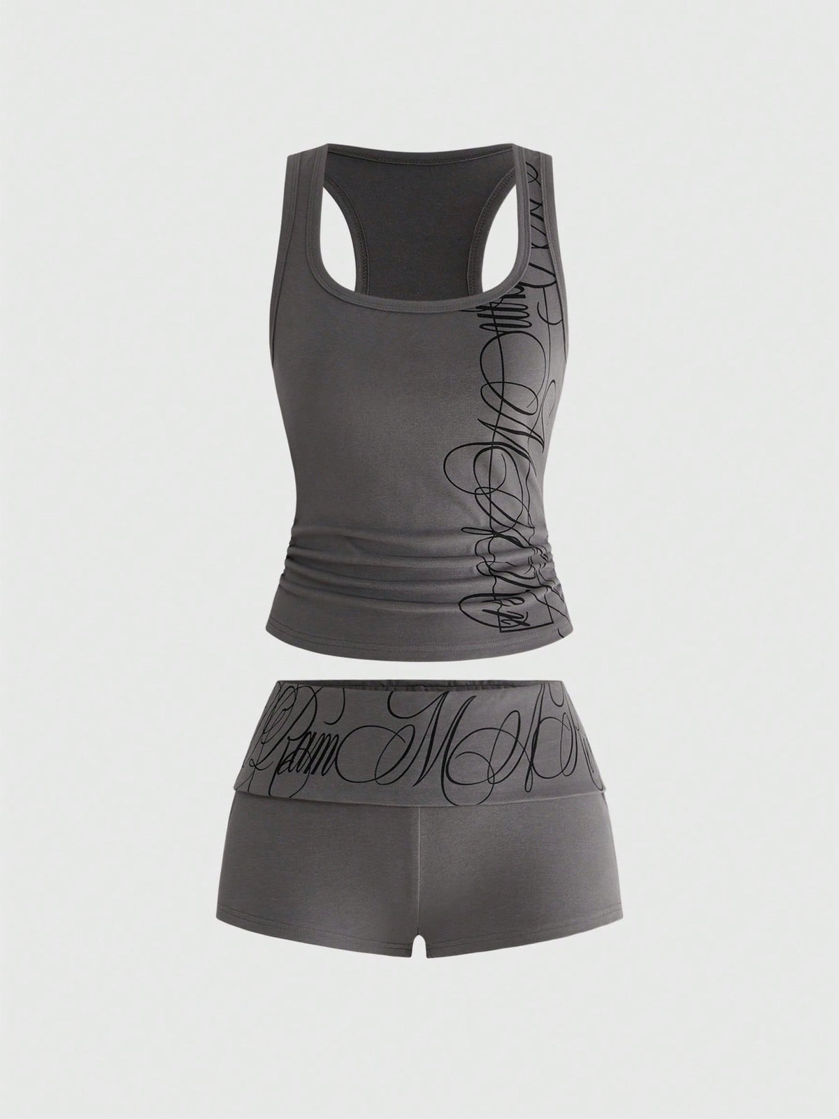 Punk-inspired two-piece set with a fitted scoop neck slogan tank top featuring cross and rhinestone details paired with ultra low waist mini shorts.