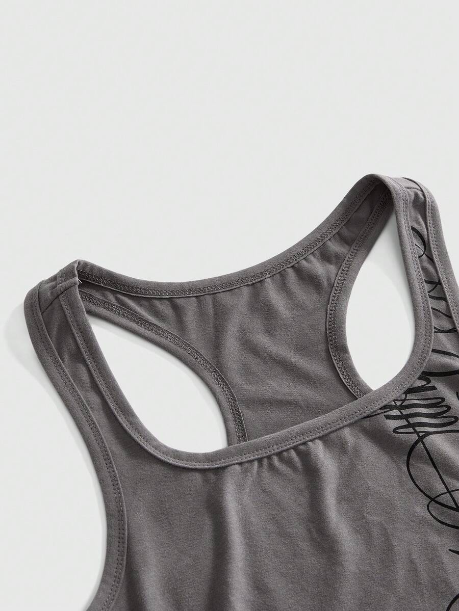 Punk-inspired two-piece set with a fitted scoop neck slogan tank top featuring cross and rhinestone details paired with ultra low waist mini shorts.