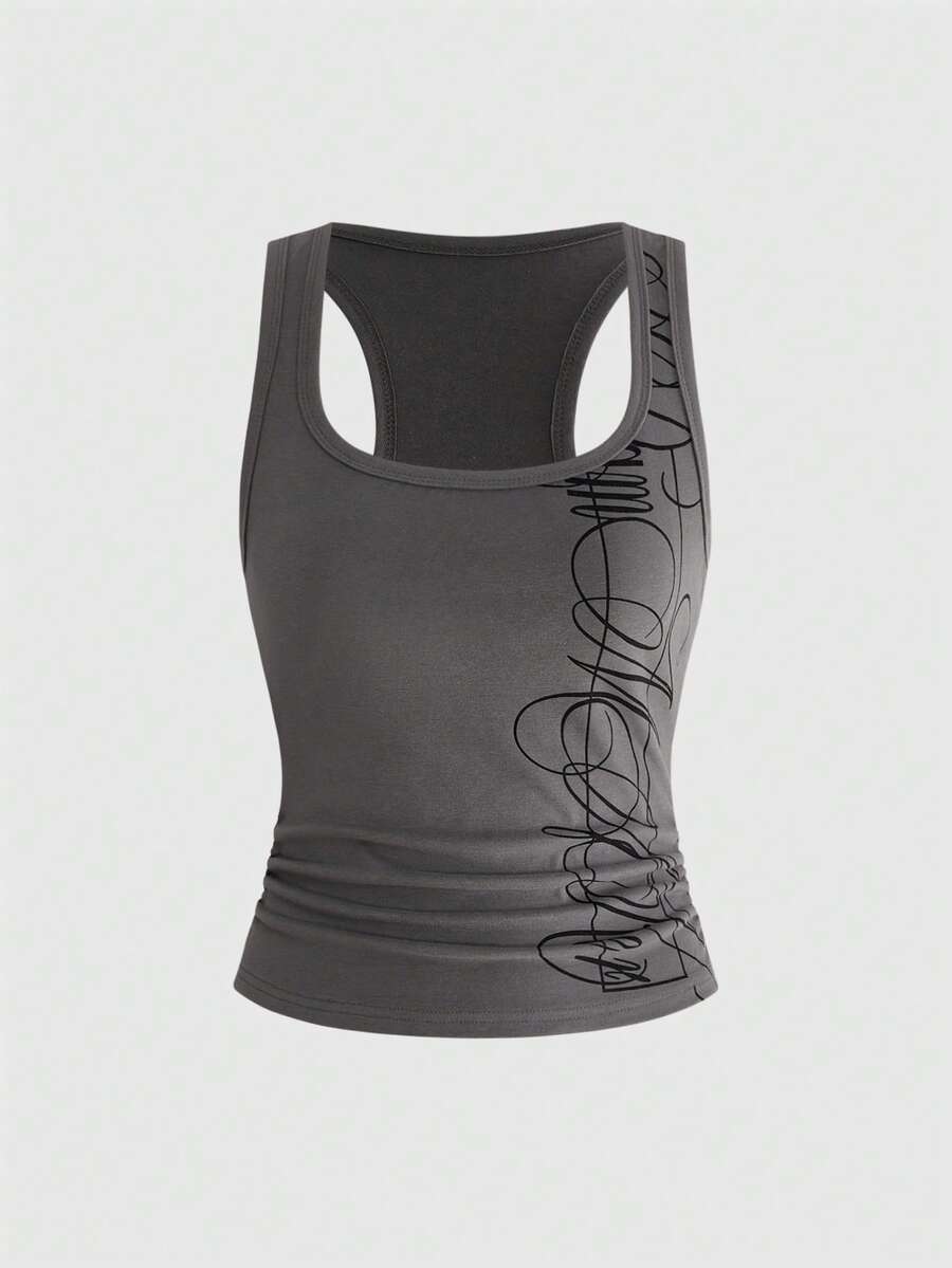 Punk-inspired two-piece set with a fitted scoop neck slogan tank top featuring cross and rhinestone details paired with ultra low waist mini shorts.
