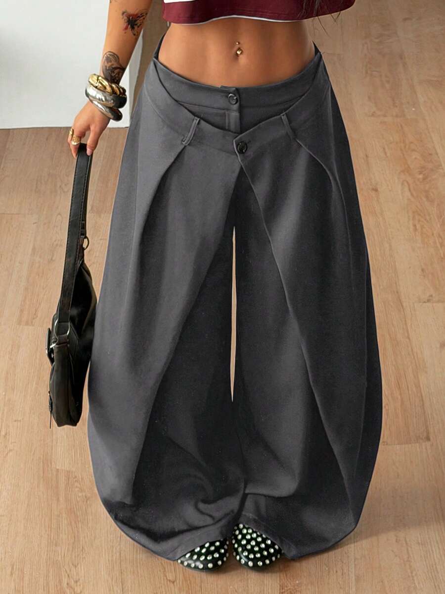 Women's loose fit pleated wide leg pants in royal blue pinstripe woven fabric with zipper fly closure.