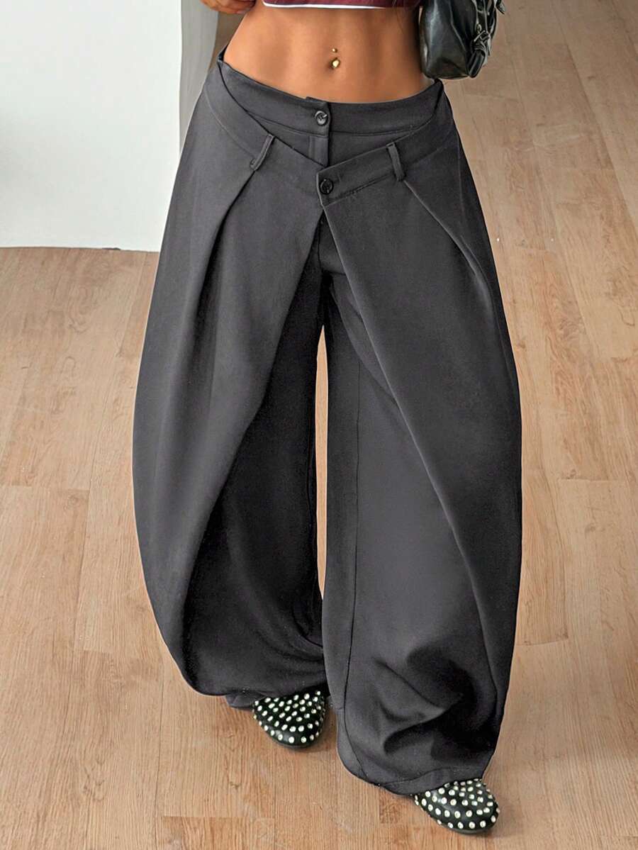 Women's loose fit pleated wide leg pants in royal blue pinstripe woven fabric with zipper fly closure.