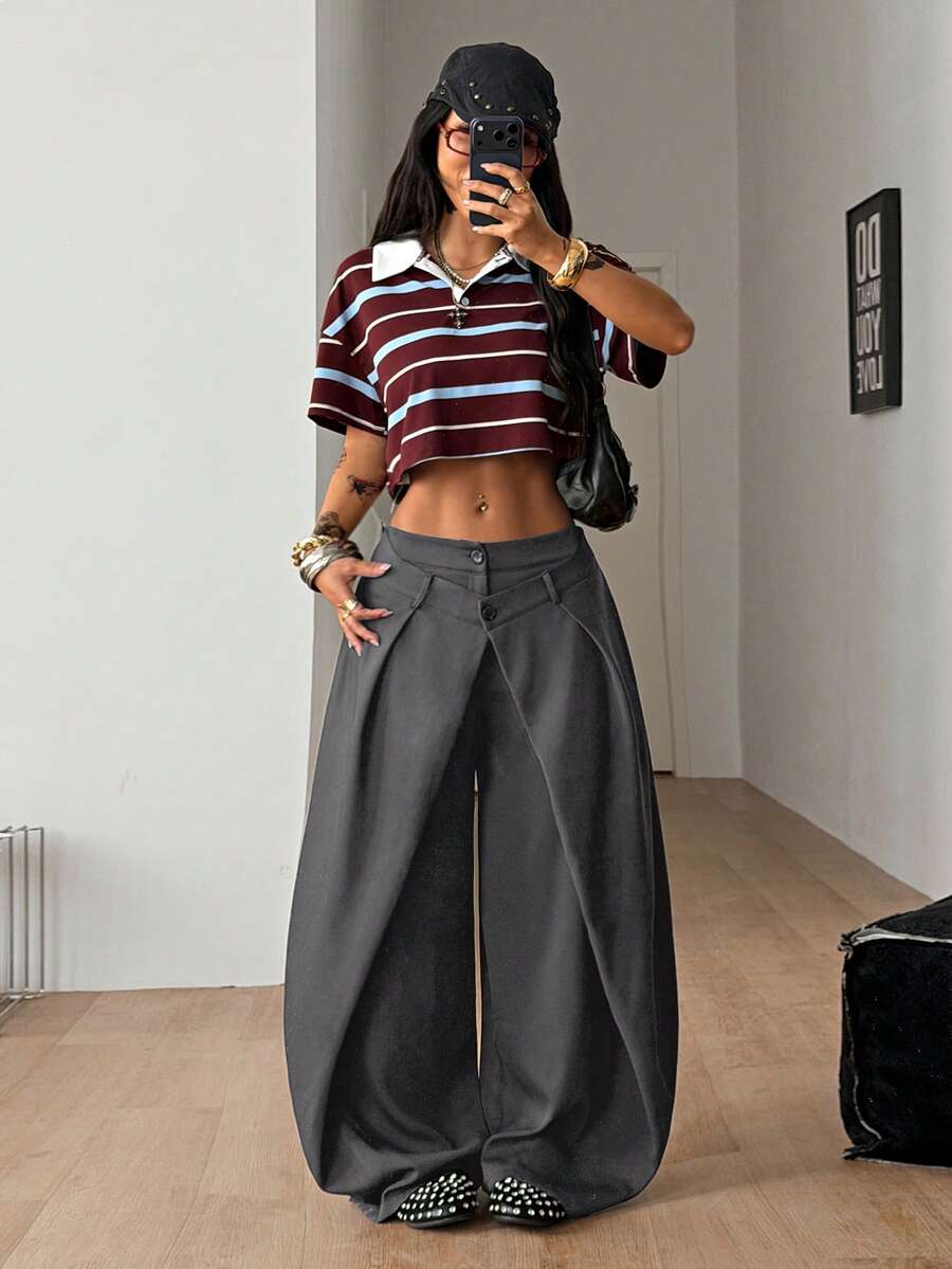 Women's loose fit pleated wide leg pants in royal blue pinstripe woven fabric with zipper fly closure.
