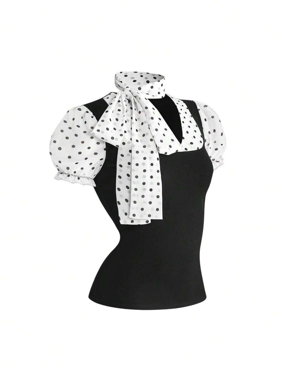 Women's black short puff sleeve graphic print t-shirt featuring a sweetheart neckline and knot detail.