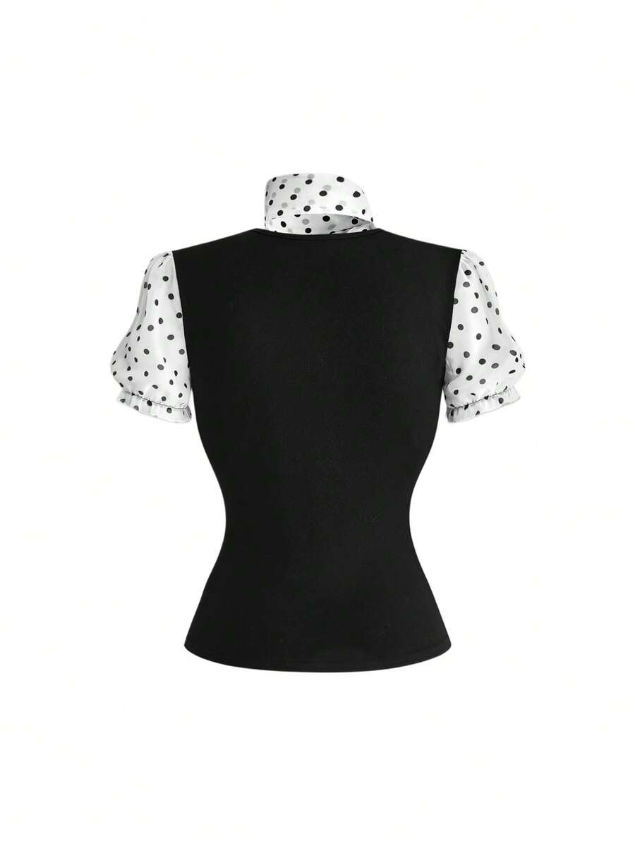 Women's black short puff sleeve graphic print t-shirt featuring a sweetheart neckline and knot detail.