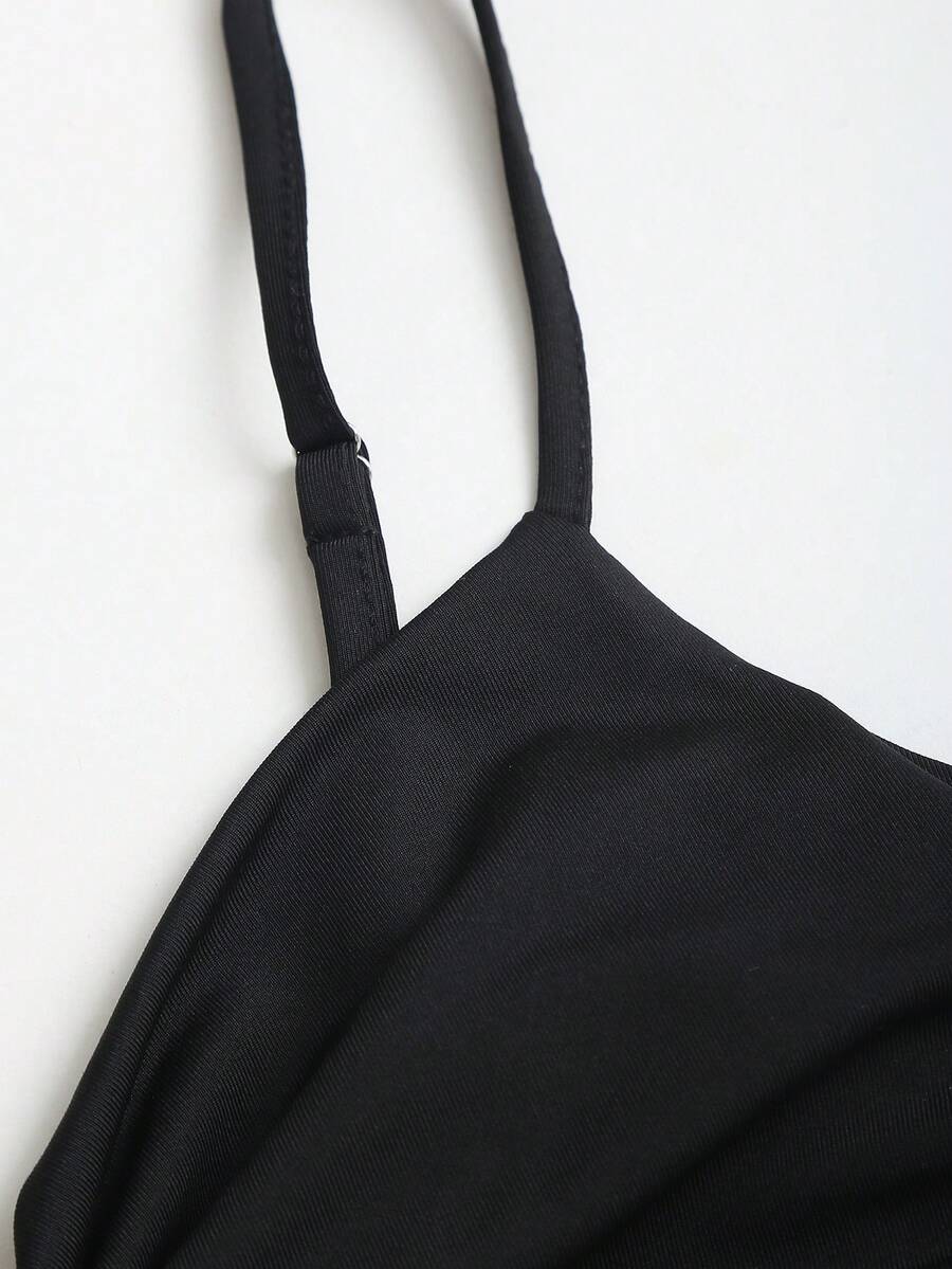 Women's short cami dress with cowl neck, spaghetti straps, contrast lace patchwork, pleated detail, and asymmetrical hem