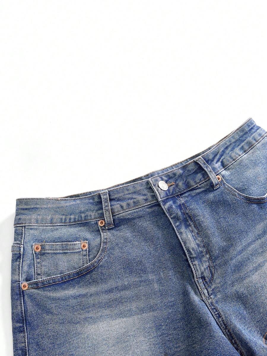 Front view of women's plus size skinny denim shorts featuring lace patchwork detailing, mid-rise waist, button zipper closure, and classic pockets.
