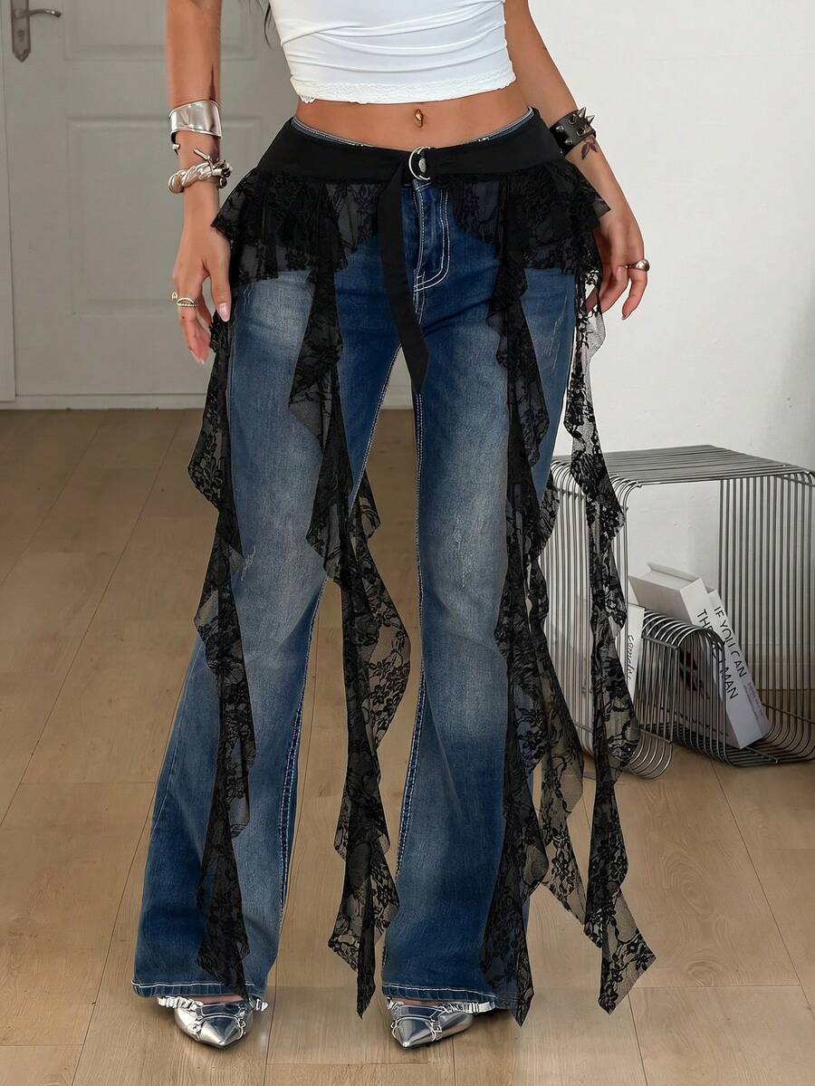 Women's black semi-sheer lace asymmetrical skirt with fringe details, contrast lace, low waist, and ruffle hem for beach, party, concert, or festival outfits.