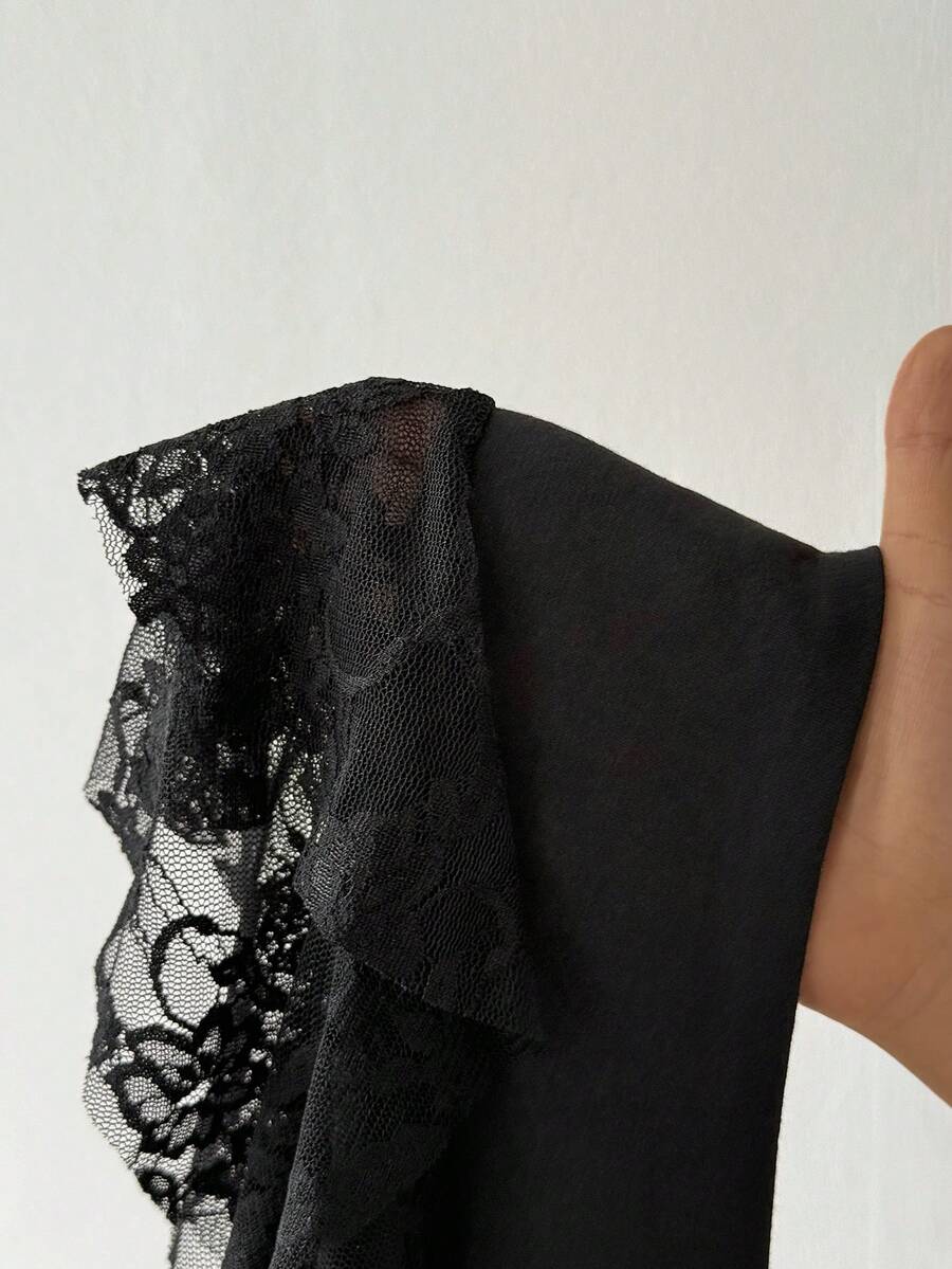 Women's black semi-sheer lace asymmetrical skirt with fringe details, contrast lace, low waist, and ruffle hem for beach, party, concert, or festival outfits.