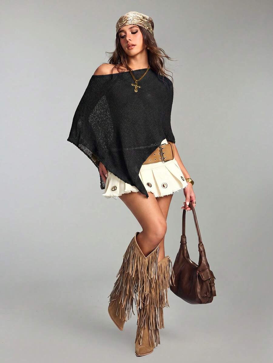 Women's casual hollow knit poncho top with boat neck, cloak sleeves, and asymmetrical hem